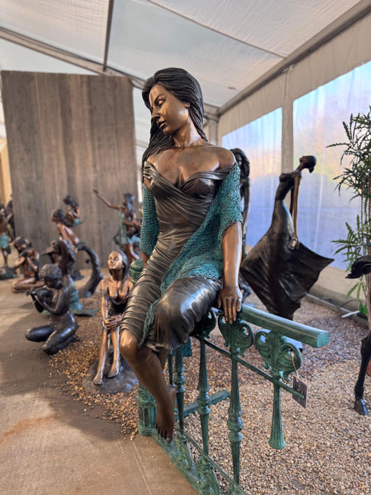 Lady on the Fence – Bronze Sculpture. 105x90x170cm